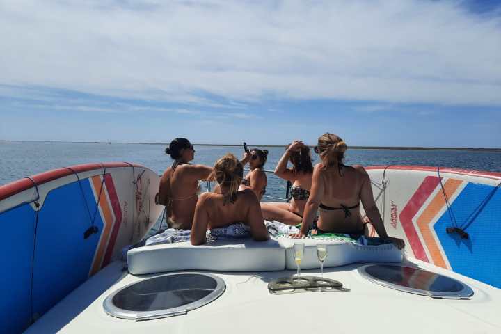 a group of people on a beach