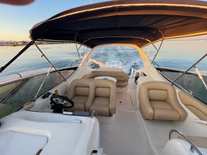 a boat sitting next to a body of water