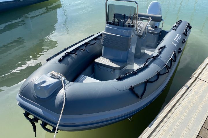 a boat parked next to a body of water