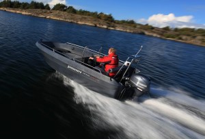 a small boat in a body of water