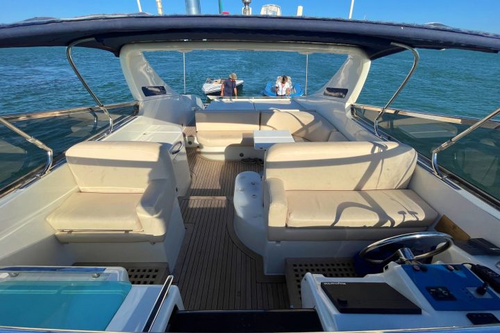 a boat is docked next to a body of water