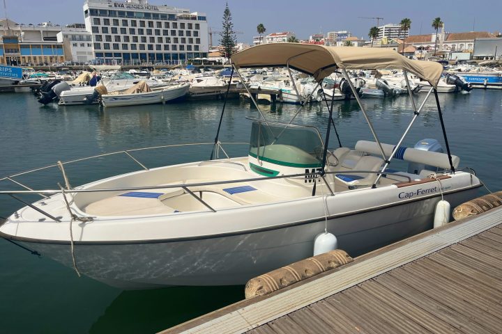 a boat is docked in a harbor