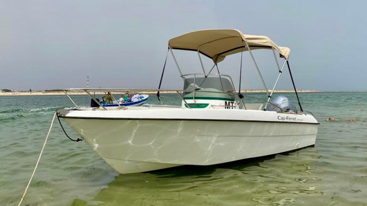 a small boat in a body of water